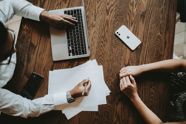 Estate planning consultation with documents on a table